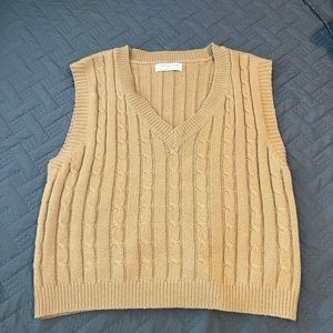 tan sweater vest